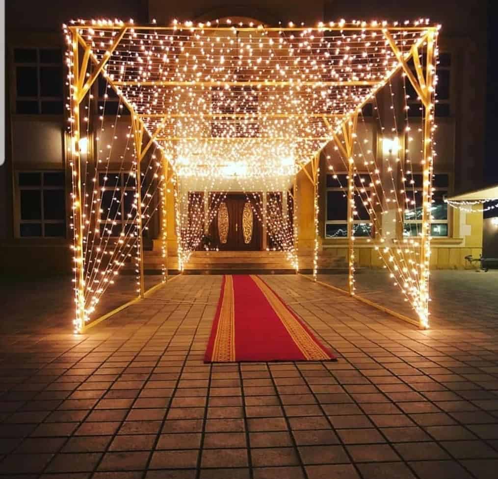 Fairy and festoon lights decorating an outdoor evening events أضواء زينة وفيري لايت لتزيين البيوت والحفلات الخارجية